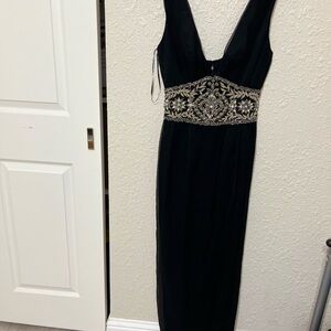 Chic Black Backless Dress with Gold Detailing